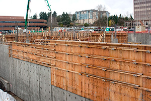 Construction of a concrete wall using MDO plywood for an apartment complex in Tacoma, Washington