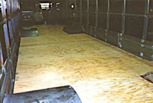 Wood structural panel truck floor