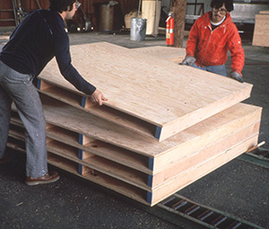 solid-deck engineered wood pallets